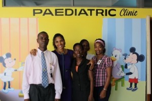  Tracy Evans-Gilbert (With stethescope around her neck) and her Teamat the Cornwall Regional Hospitals Paediatric HIV Clini